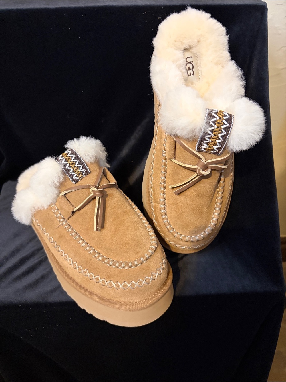 New UGG with no box tan with tassel size 8